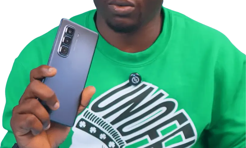 a man holding Infinix Hot 50 Pro Plus phone